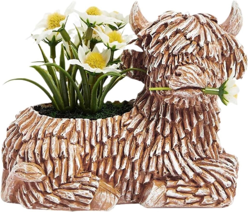 Highland Cow Planter displaying flowers in them as an example